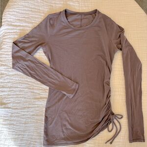 Lululemon pale purple gathered top. Side gather with tie, super cute!